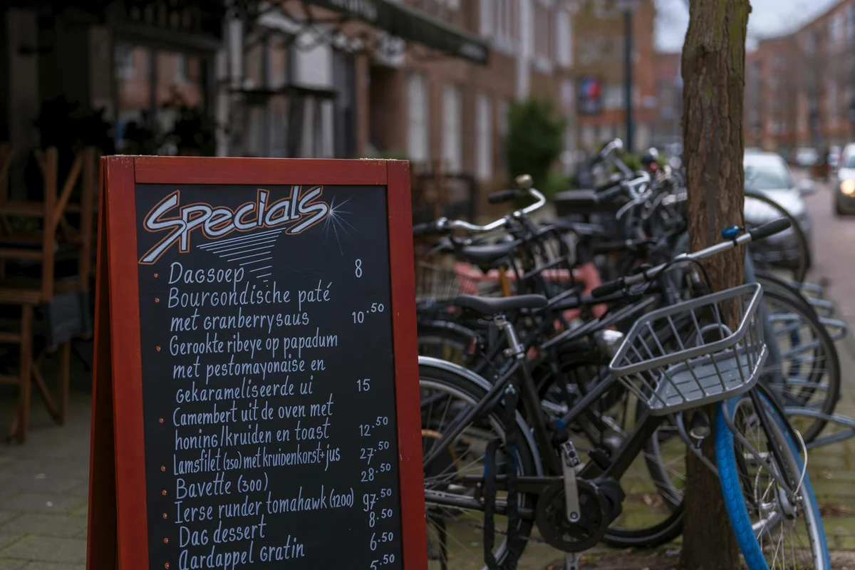 Photographer Maren Solberg working with medium format camera in natural light studio